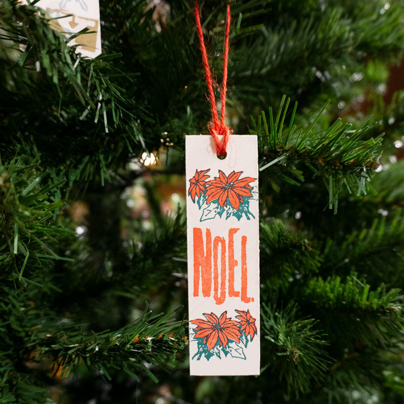 
            
                Load image into Gallery viewer, Noel Wooden Ornament
            
        